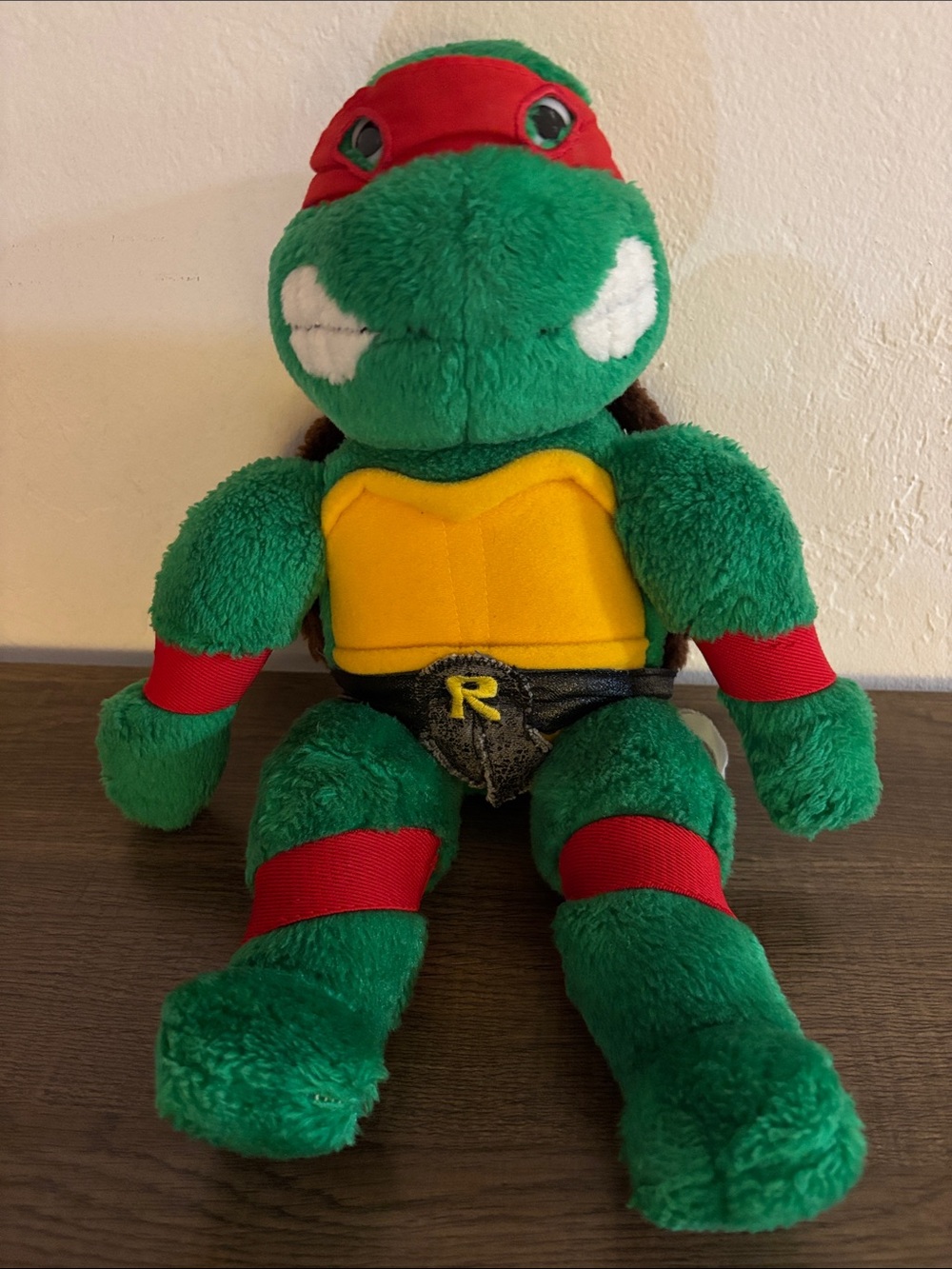 Ninja Turtle Green Plush Reptile Toy with Yellow Shell and Red Accents